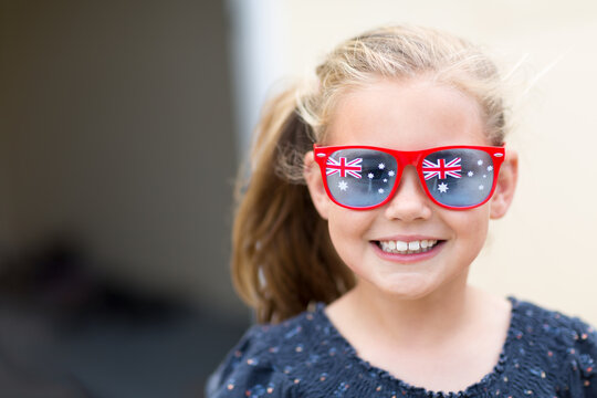Young girl wearing Australian Flag sunglasses for Australia Day