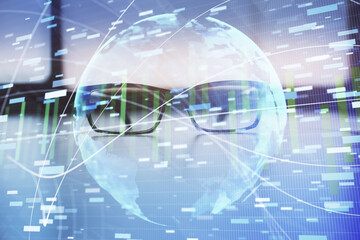Business theme hologram with glasses on the table background. Concept of search. Double exposure.