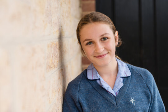 portrait of a young teen in school uniform, with copyspace