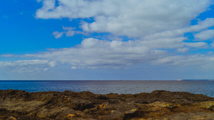 clouds over the sea at the coastline