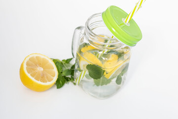 
Drink with lemon, mint and ice. All this on a white background