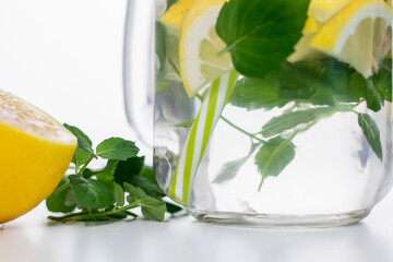 
Drink with lemon, mint and ice. All this on a white background