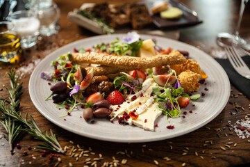 Cheese platter for two: Goat cheese cream, gorgonzola, camembert, grissini and fig jam. Delicious...