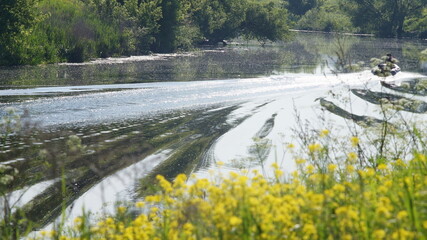 a trace on the water from a passing boat