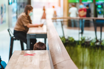 Alternative seating mark for social distance rules in the mall distance for one seat from other people to protect from Corona Virus(COVID-19), social distancing for infection risk.New normal lifestyle