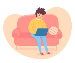 Freelancer man sitting with laptop on sofa at living room