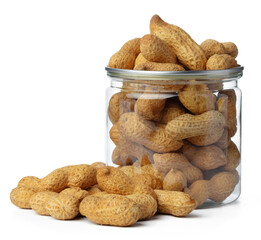 Glass jar with peanuts isolated on white