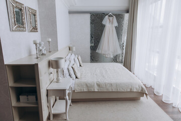 Fototapeta na wymiar White dress of the bride. Wedding accessories.