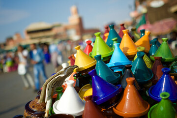 Marrakech's Jemaa el Fna square and colorful tagine pots.