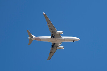Fototapeta na wymiar Close-up of a plane in the sky