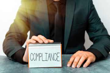 Conceptual hand writing showing Compliance. Concept meaning ability of an object to yield...
