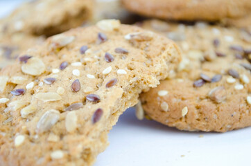 Cereal cookies with seeds and nuts close up. Healthy food, gluten free diet