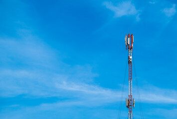 Cell tower against the blue sky