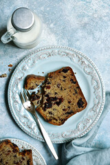 Banana cake with chocolate drops. Top view with copy space.