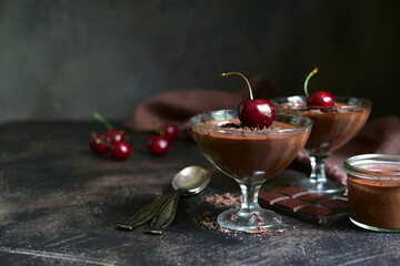 Homemade delicious chocolate mousse with cherry.