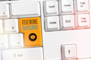 Writing note showing Stay Home Save Lives. Business concept for lessen the number of infected...