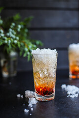 cocktail ice syrup drink in glass sparkling water tonic alcohol or non-alcoholic beverage portion serving food background copy space 