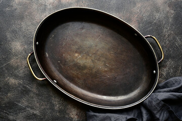 Culinary background with empty old pan.Top view with copy space.