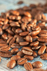 Close up roasted coffee beans on  table and copy space.