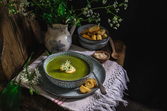 Green nettle and wild garlic soup with croutons