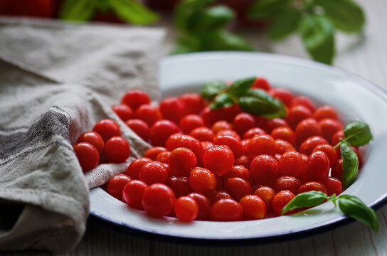 Close up fresh juicy small red tomatoes