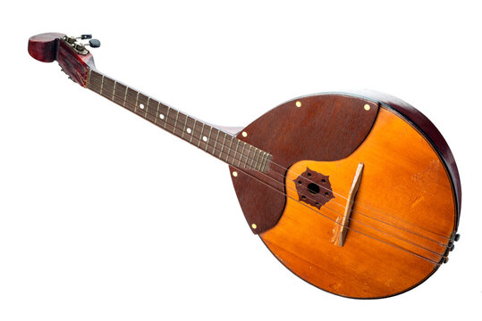 Domra isolated on a white background. Ukrainian, Belarusian and Russia folk string instrument of the lute family with a round case.