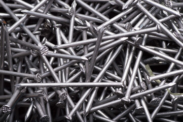 macro background of metal construction nails close up