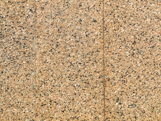 Facade walls are covered with marble tiles