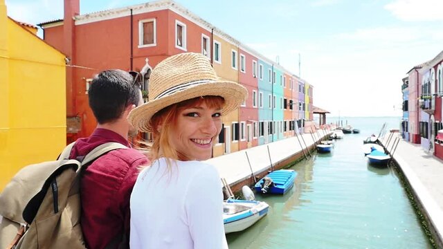 Young couple in Venice. Lifestyle travel moments in the beautiful italian city. Concepts about Venezia and Burano