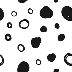 Doodle circles seamless pattern. Black dots texture background.