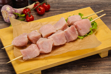 Raw pork meat skewer for grill