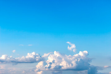 Naklejka na ściany i meble Blue sky with white clouds in sunny day.