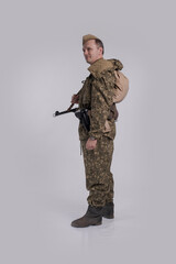 Male actor in the uniform of an officer of the army reconnaissance group of the Soviet Army during...