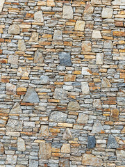 Wall built of natural stone. Can be used as background. Great background or texture.