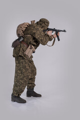 Male actor in the uniform of an officer of the army reconnaissance group of the Soviet Army during...