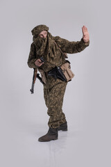 Male actor in the uniform of an officer of the army reconnaissance group of the Soviet Army during...