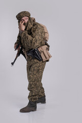 Male actor in the uniform of an officer of the army reconnaissance group of the Soviet Army during...