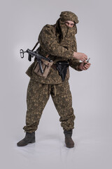 Male actor in the uniform of an officer of the army reconnaissance group of the Soviet Army during...