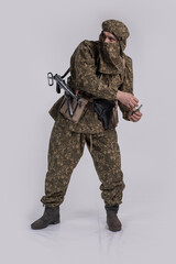 Male actor in the uniform of an officer of the army reconnaissance group of the Soviet Army during...