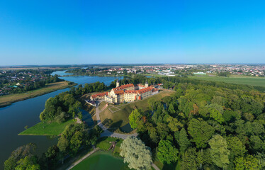 Nesvizh Castle is a residential castle of the Radziwill family in Nesvizh, Belarus, beautiful view in the summer against the blue sky.