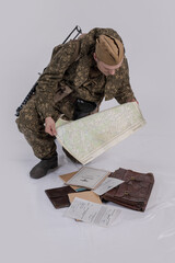 A male actor in the historical uniform of an officer of an army reconnaissance group of the Soviet...