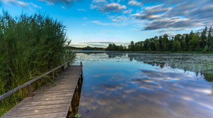 Naklejka premium Lakeside camp site in charming Sigulda, a small town in a picturesque stretch of the primeval Gauja river valley in the Vidzeme Region of Latvia