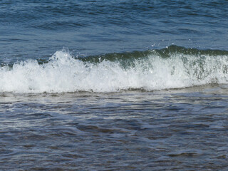 Photo of the breakers in the see at the Dutch coast.