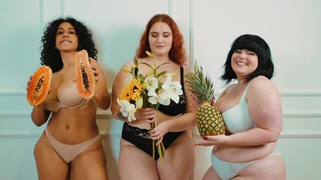 Three women posing for studio portraits. Celebrating and having fun. Concept about lifestyle and body positivity