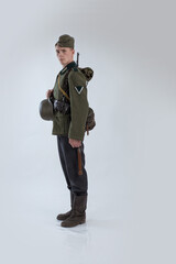 Male actor reenactor in historical uniform as an officer of the German Army during World War II