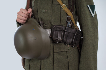 Male actor reenactor in historical uniform as an officer of the German Army during World War II