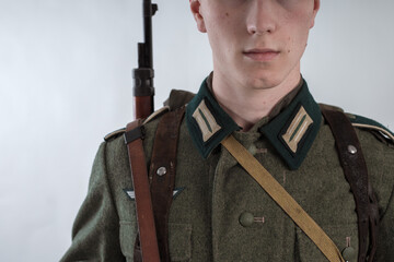 Male actor reenactor in historical uniform as an officer of the German Army during World War II
