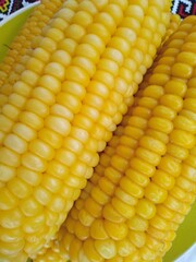 freshly boiled corn on a traditional towel.