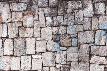 Wall built of natural stone. Can be used as background. Great background or texture.