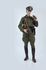 Male actor reenactor in historical uniform as an officer of the German Army during World War II